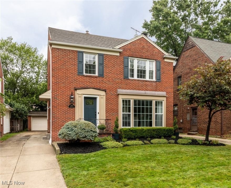 Your search for the perfect home is over! Welcome to this fully renovated all-brick Colonial on a prime University Heights street. From the curb, this home makes a statement with refreshed landscaping, exterior lighting, updated shutters, and a newer front door. Step inside to a spacious combination Living and Dining room, highlighted by a full-wall front window, newer Luxury Vinyl Tile floors, custom tile work on the gas fireplace, and newer chandelier in Dining area. The Chef’s Kitchen, newly remodeled, features Whirlpool Stainless Steel appliances, Quartz countertops, hand tiled backsplash, custom cabinetry and island with breakfast bar and custom wine rack. A cozy Den with electric fireplace provides the perfect retreat, while a stylishly updated Powder Room adds convenience. Upstairs, find three freshly painted bedrooms with Bamboo flooring and solid wood doors. The Primary Suite boasts a tray ceiling and ceiling fan, with a beautifully renovated Full Bath offering both tub and walk-in shower. Don’t miss the charming rooftop garden off the second bedroom—an ideal spot to unwind. The Lower Level impresses with a Manhattan-inspired Additional Living Suite: new LVT floors and drywall (2024), bedroom with egress window, and a luxe Spa Bath with glass shower, modern vanity, and all-new plumbing (2024). Additional storage and laundry complete the basement. This home has been meticulously cared for—no detail overlooked, every upgrade thoughtfully designed. Will be POS compliant. Move right in and enjoy!