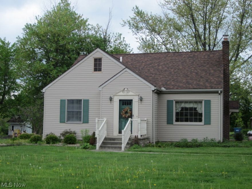 Looking for a bit of country close to all the city amenities? Look no further! This cutie pie sits on a acre of land just over the Liberty Township line. Roof 2013. Vinyl sided. Easy maintenance updated landscaping to enjoy with brick walkways. From a neat and tidy exterior, you will walk in and know the owner really loves their home. The foyer is spacious and opens to the living room with woodburning fireplace. This room floods with natural lighting. The formal dining has a door out to the tiled back porch! Kitchen with appliances and freshly painted, real wood  cabinets, and a huge pantry closet! Two first floor bedrooms and a first floor full bath. Upstairs is a HUGE master suite with a nice walk in closet, study area with bookshelves, and a master full bath! Full basement, sump pump, updated electrical panel 150 amp, Glass Blocks, Trane Furnace, Central Air. Washer and dryer can stay in the laundry room in the basement. NEW in 2014 a whole house generator, Don't worry YOU will have