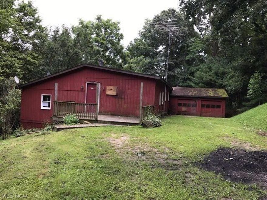Create your own world on approximately 21.35 acres! Ranch style property with 3 bedrooms, 1.5 baths,+/-1,848 SF, porch, attached garage and more. Home is in need of some rehab but has so much potential. Come see what you can do and submit an offer today.