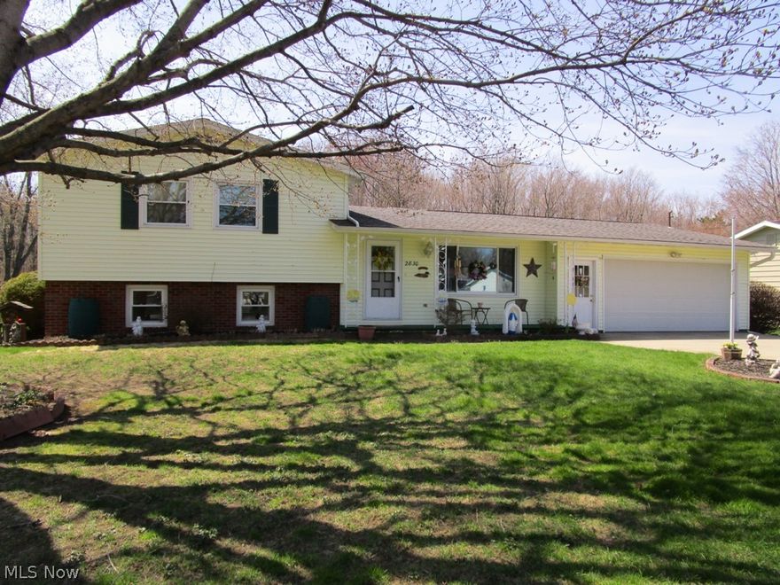 Lots of space in the Buckeye multi-level home.  Main floor features living room with electric fireplace, eat-in kitchen remodeled in the 90s, bath with roll-in shower and beautiful sunroom (added 2005.)  Upper floor features 3-bedroom and full bath.  Lower level has family room, 4th bedroom and laundry/utility room with half bath and large crawlspace access.  Gorgeous hardwood floors and laminate flooring. 2-car attached garage, rear deck, 2-large sheds, front porch, concrete drive.   More updates: Roof 2008, Basement de-watering system 2011 with transferrable warranty, Boiler 2001.   Home also has vinyl siding and windows.  12-month America's Preferred home warranty for the buyer.  Average utilities costs for the last 12 months as of 6/2015 Electric: $86 per month, Gas: $58 per month per the utility companies.  All appliances are included.  Don't wait.
