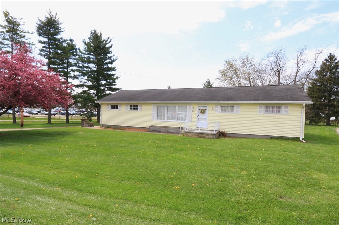 Excellent location! Enjoy friendly conversation from the passer-byers on The Genesis Fitness Trail right from your covered back patio! Care and love has been put into this home for many years located on Maple Avenue. Beautiful hardwood flooring throughout, nice floor plan and move in condition! This home has been within the same family since construction, and ready to be passed on to its new owners!