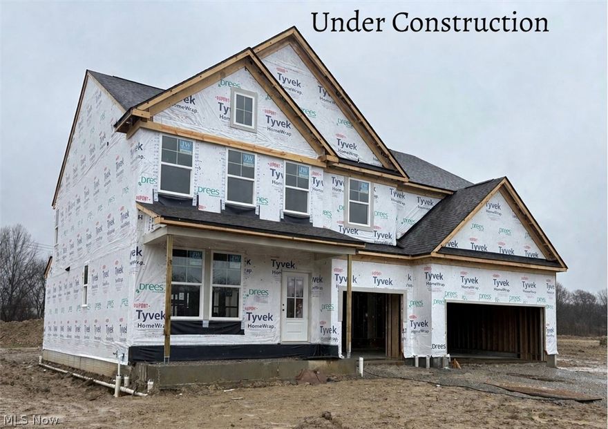 Introducing the stunning Vanderburgh floor plan by Drees Homes a thoughtfully designed home that perfectly blends luxury, comfort, and functionality. Situated within the highly acclaimed Hudson City School District and near several prestigious private schools, this community offers families exceptional educational opportunities just minutes from home. Located near the breathtaking Cuyahoga Valley National Park, residents can enjoy hiking, biking, and exploring the scenic beauty right at their doorstep. From the moment you arrive, the inviting covered front porch welcomes guests with warmth and charm, while the spacious three-car garage provides ample room for vehicles, storage, and hobbies. Step inside to discover an open-concept layout ideal for both everyday living and entertaining. The gourmet chef's kitchen is the heart of the home, featuring elegant quartz countertops, an oversized island, built-in ovens, and stylish two-tone cabinetry. Whether hosting holiday gatherings or casual dinners, this space is designed to impress. Unwind after a long day on the covered back porch and enjoy cozy evenings by the gas fireplace. Working from home is effortless with a private office tucked away from the main living areas, offering the quiet and focus you need. Upstairs, you'll find four generously sized bedrooms and three full bathrooms  ensuring comfort and convenience for everyone. The second-floor game room creates the perfect space for fun and relaxation, while the finished basement with 9-foot ceilings is ready for movie nights, entertaining, or additional living space. With exceptional design, abundant space, and luxurious finishes throughout, this home truly has it all. Don’t miss your opportunity  this one won't​​‌​​​​‌​‌​​​‌‌​​​‌‌‌​​‌​​‌‌​​​​ last!