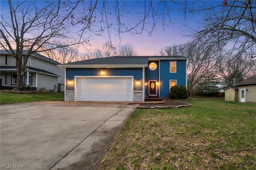 Welcome to 1057 Ty Drive! This beautiful home is ready for you to come and make it your own. This home has a first floor primary with ensuite bathroom as well as another first floor bonus room that the current owners used for a home office but could be used as an additional bedroom. Large kitchen with brand new counter tops, all of your appliances, and a breakfast bar opens up into the family room with vaulted ceilings, gas fireplace with stone surround, and and door exiting to the back yard. Pass into the living room with hardwood floors that overlooks your scenic FULLY fenced in back yard! A first floor half bath and large welcoming foyer finish up the main floor living. Upstairs you'll find a carpeted loft, perfect for a play area, study, or work space. Additionally, you'll find two huge bedrooms with large closets and a spacious second floor full bathroom. The basement is unfinished but framing has been completed for you to customize a finished basement to your preferences! There's another half bath in the basement, which is plumbed to be a full bath in the future! Work shop and laundry room complete the basement, giving you a so much space for storage, a workout area, playroom, or second living space to meet all your needs. On the exterior side of the house you'll see an incredible raised bed garden area, complete with trellis and white picket fence, just in time for you to plant flowers or vegetables for this summer! Don't miss this beautiful home, schedule your showing today!