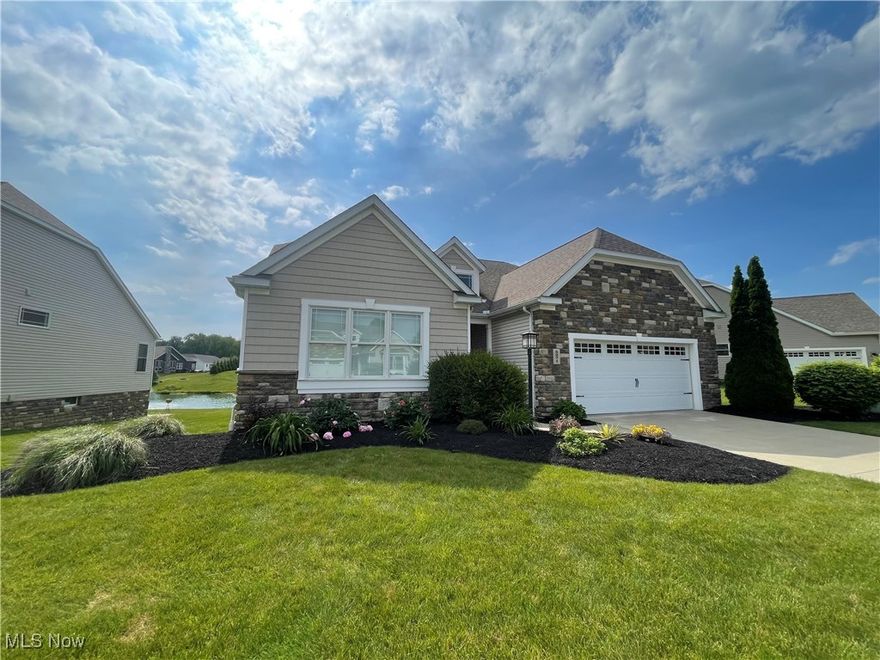 Welcome to Waterside Condominiums! This custom build detached condo is one of a kind with soaring ceilings with an open concept living room and kitchen that is absolutely breathtaking. This home features high quality cabinetry, flooring, and lighting throughout the condo. Enjoy your morning coffee on your deck taking in the water views with the  relaxing sound of the fountain on the HOA owned pond. The additional features include a large owners suite with large owners bath, an extra deep two car garage, and a partially finished basement with its own bedroom and full bath. Everything in this remarkable condo is of the highest quality including the high efficiency HVAC and a luxury you can rarely find a fully transferable warranty on the foundation until the year 2044 from Tremco from the original builder offering true confidence to the next owner. The HOA development has gorgeous lighting throughout and has the added benefit of being very private and limited offering a very unique experience to condo living. All lots are sold in this development so schedule a showing today to this the one of kind home today!