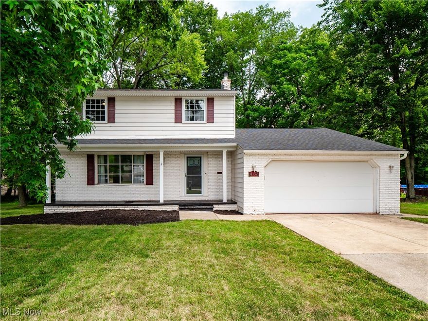 Welcome to 8132 Pinehurst Drive! A beautifully updated colonial tucked away on a quiet cul-de-sac in Parma. This 3-bedroom, 1.5 bathroom home offers over 1,600 square feet of living space and sits on a private ¼ acre lot. The main level features a fully renovated kitchen with new cabinetry, quartz countertops, stainless steel appliances with coordinating vented range hood, and updated lighting. Luxury vinyl flooring flows throughout the entire first floor, seamlessly connecting the open kitchen to a spacious family room with direct access to the backyard patio which is perfect for entertaining or relaxing. Completing the main level is an updated half bathroom. Upstairs there are three generously sized bedrooms and a completely remodeled full bathroom with a modern tile shower, updated fixtures, and tile flooring. The full bath also offers direct access from the primary bedroom. Downstairs, the unfinished basement provides excellent storage with future finishing potential, and includes brand-new glass block windows. Other recent updates include a new roof, gutters with gutter guards, fresh interior paint, and updated landscaping. Located in a great Parma location, this home offers easy access to local parks, including West Creek and Big Creek Reservations, Ridgewood Golf Course, and numerous shopping and dining options at The Shoppes at Parma. With its thoughtful updates, peaceful setting, and proximity to community amenities, this move-in-ready home is a must. Come see today!