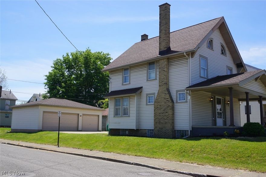 This great 3 bedroom, 1.5 bath home is ready for its new owner!  Conveniently located close to HOF Village this home offers what most others do not -- a 3 garage garage and first floor laundry/half bath!  Freshly painted & spruced-up with original hardwood floors & all the character & charm an older home provides.  The large living room has a full wall of shelving surrounding a fireplace and leads to a dining room with charming built-in corner cabinet.  The kitchen has room for a small table & all appliances convey. The adjacent laundry room/half bath is super convenient with walk-in pantry closet.  Upstairs you'll find 3 bedrooms & a large full bath with shower/tub. The walk-up attic provides great storage -- or finish the space for additional living space! Add'l storage & a Rec Room in the clean basement. Charming front porch and THREE CAR GARAGE with openers!