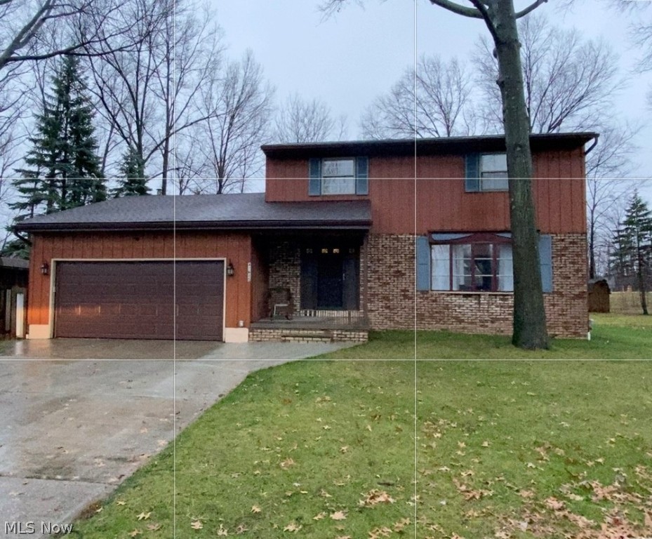 This charming home features numerous updates. Walk through the newly installed front door into the open and welcoming foyer that leads to the living room with it's new laminate flooring and large front window. The living room leads you into the dining room which has the same beautiful laminate flooring. The dining room leads you to the completely remodeled kitchen (2017). Everything was updated including cabinets, countertops, tile backsplash, lovely porcelain tile floors and stainless steel appliances. While in the kitchen you can't help but notice the spacious family room with new laminate flooring and large brick fireplace that's perfect for winter evenings. Watch the snow fall through the large patio doors that lead to the three season room. There you will discover great views of the large backyard and the oversized storage shed. Next retreat upstairs where you'll find the master bedroom which boasts 4 closets and a private master bathroom. This home features lots of new up