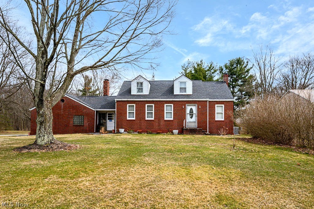 This home w/ 5 acres has a nice country setting. The home is very spacious with a large great room w/vaulted ceilings & wood burning stove. The kitchen is located to the center of the home and fully applianced with stove, fridge, & dishwasher which will convey. The current owners are using the living room as a master bedroom w/faux fp which is very spacious. Additional 2 bedrooms, updated bath and breezeway w/fp complete the first floor. The 2nd floor has additional bedroom/bonus room and a large storage room. The 2 car attached garage complete the home. The detached 30 X 26 makes wonderful storage or great place for your 4-H animals. This property extends back 1200' which is private setting and a great place to walk, ride 4 wheeler, horses. Ohio Edison $125-130.00 per month approx.