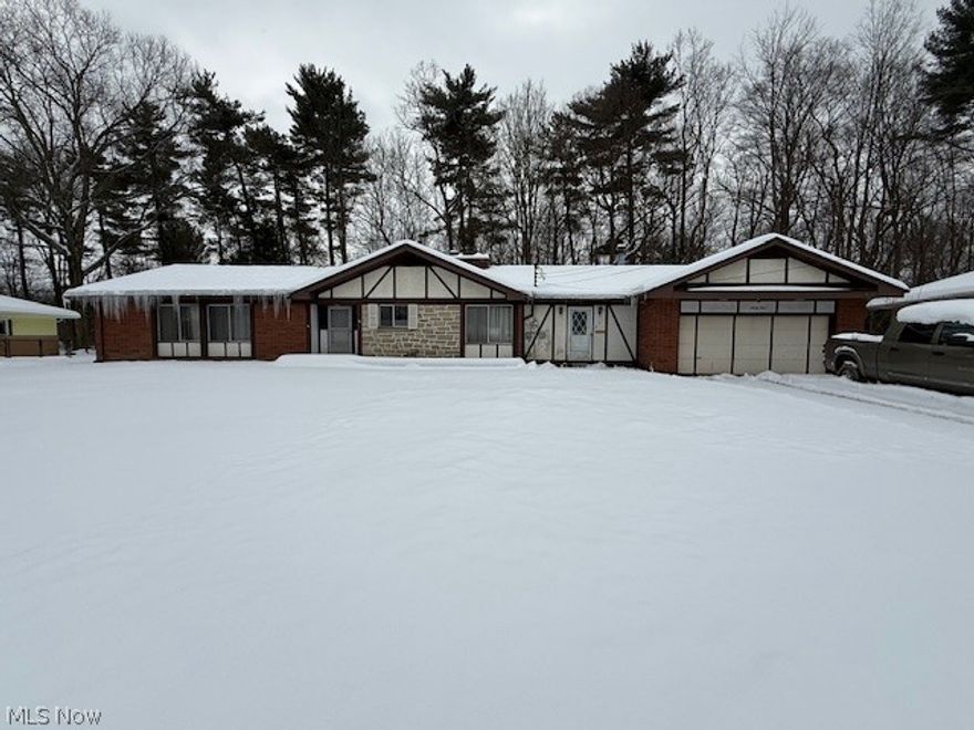 Welcome home to easy one-story living in this spacious Boardman ranch, ideally tucked on a desirable cul-de-sac! Offering 3 bedrooms, the layout includes a private owner’s suite with an attached walk-in closet and full bath. The showstopping great room features a soaring cathedral ceiling, a full wall of floor-to-ceiling windows, a handsome brick fireplace, and an entire wall of built-in shelving—perfect for cozy nights in or entertaining. A separate, oversized family room adds even more living space with hardwood flooring, a wet bar, a second brick fireplace, and an adjoining half bath for convenience. You’ll also love the practical setup of the first-floor laundry room connected to the full family bath. The bright 18x13 sunroom can be transformed into the perfect space for morning coffee or relaxing. The eat-in kitchen comes equipped with a stainless dishwasher and a newer stainless gas range. Major updates include a new furnace and central air, plus enjoy outdoor fun with an above-ground pool (new in 2025). Complete with a 2-car garage, cement drive, and a fantastic Boardman location—this home is ready for your personal touches!