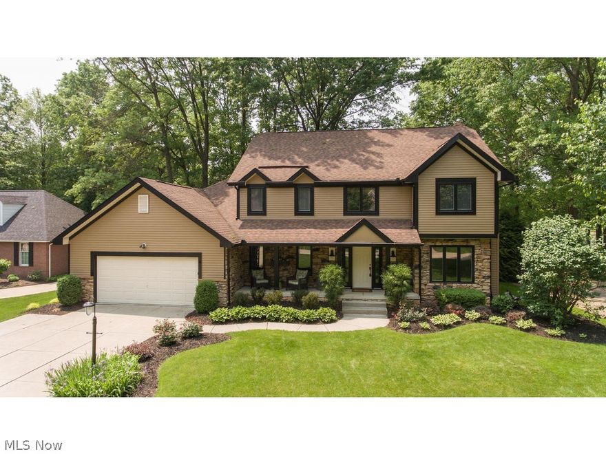 Welcome to this picturesque 5BD/3BA Colonial style home.  Enter into the 2-story foyer w/custom staircase adorned by wrought iron railing and flanked by the large living & formal dining rooms.  An expansive open floorplan includes the family room featuring a stone-walled wood burning fireplace, eating area & well-appointed kitchen equipped with extensive granite counters, abundant cabinetry, double ovens, center island, gas cooktop & all stainless appliances. Off the kitchen is the laundry room, full bath w/access to the 5th bdrm/office or playroom. Upstairs is a loft, 3 spacious bdrms, full bath and substantial master suite w/walk-in closet, updated master bath w/double sinks, granite counters, oil rubbed bronze fixtures & Jacuzzi tub. Fresh paint & new carpet thruout this home makes moving in a breeze. The finished LL offers an addit'l 1200 SF of living space which includes an entertainment area, pool table & home gym. An extra multipurpose room on the lower level offers additional o