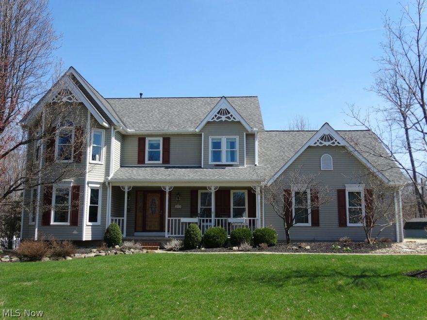 Spacious colonial in Royal Valley. 4 bedrooms, plus a living suite, with additional bedroom added in tandem over garage, possible 5 bedroom. Formal living room, formal dining room, eat-in kitchen. Family room has wood burning fireplace/wood burner with bay window overlooking beautiful  back yard. Large relaxing tiered deck (just repainted!) with power awning and wooded views. Quality finished basement with 3rd full bath and workshop area. First floor has just been freshly painted. ALL major improvements have been done! Roof (complete tear-off) and gutters 5/2012. Furnace & C/A 2010. Front windows replaced 2009. Rear windows replaced 2012. Also includes a whole house attic fan that draws out hot air and helps keep cooling costs down. One year home warranty provided by sellers thru America's Preferred Home Warranty. HOA fee is for: all green space maintenance, retention basins (3 in development), sign lighting at entrances, taxes for green spaces. Square footage from auditor does not inc