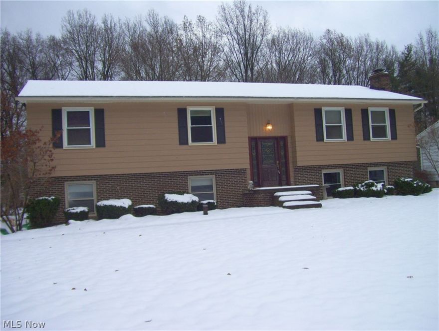 Welcome to this updated, 3 bedroom, 3 full bath bi-level with newer bathrooms and a finished lower level. Improvements include new furnace and air in 2012, water heater in 2012, new deck in 2016, new carpet (a week ago), electric box in 2013, master bath in 2014, lower level bathroom in 2016, roof in 2011, exterior painted in 2011, kitchen remodeled in 2010, and insulation added in 2015. There is a newly remodeled family room on the lower level with a gas fireplace and full bath. Kitchen has all stainless steel appliances; washer and dryer remain. Large flat back yard with a shed for extra storage. Move right in to this spacious, clean, and neutral home. Close to expressways, yet nestled in a quiet neighborhood, one convenient to all amenities. Revere Schools.