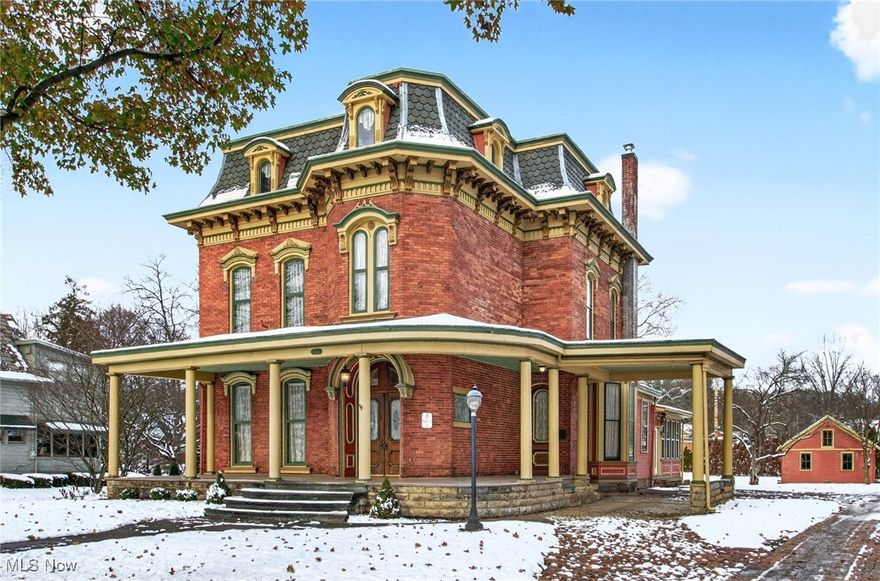 Restored brick Victorian home built in 1874. A "Heritage Home" designated by the Tuscawaras County Heritage Home Association. Original character of the home with all the modern updates. Newer zoned HV/AC and hot water tank. Updated electric. First floor laundry. Four season room. Four fireplaces and beautiful woodwork throughout the home. Crown molding. Hardwood floors. Eleven and twelve foot ceilings. Two staircases one of which is a spiral staircase. Large wood front doors with etched glass. Huge unfinished third floor. Covered wrap around porch. Oversized three car garage with a dedicated electric panel. Deduct meter. Easy walk to downtown.