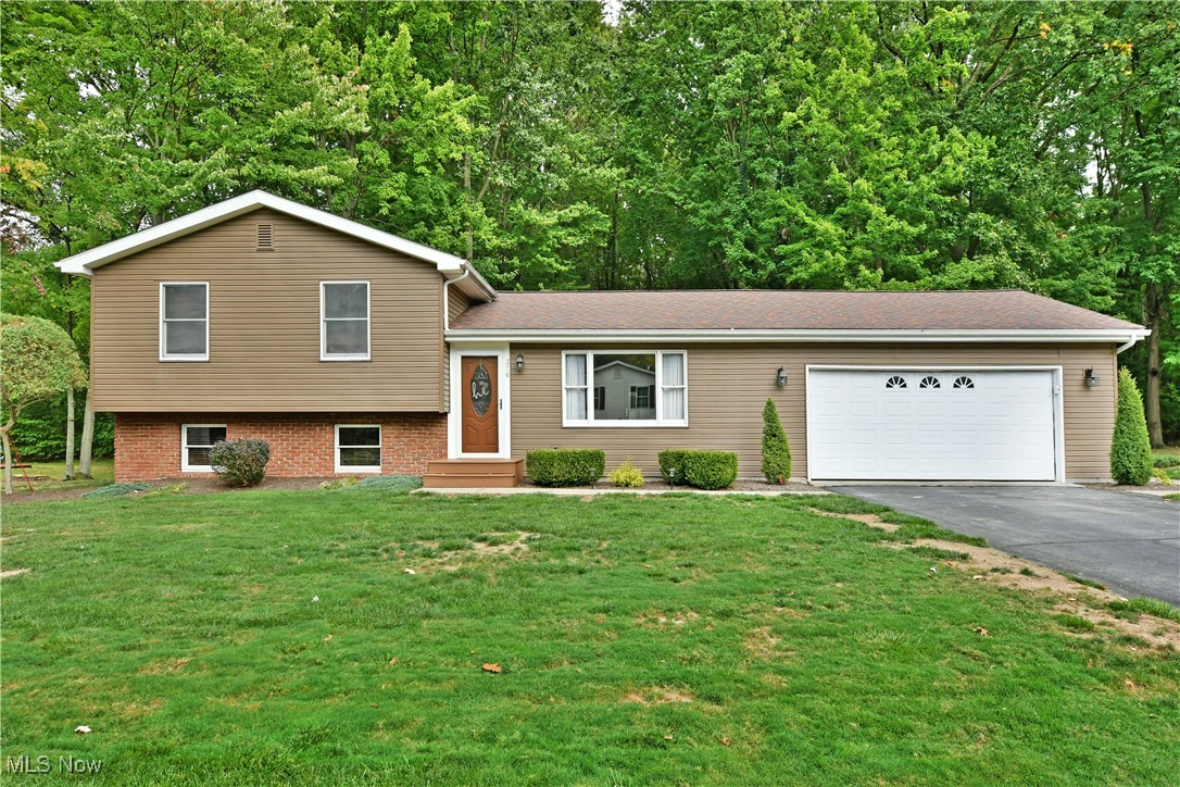 Prepare to be impressed by this stunning spilt level home in Cortland, Ohio! Unlock your dream home in Lakeview school district. The modern kitchen is equipped with granite counter tops, white wood cabinets and tile flooring. The spacious living area features a dining room, living room, 2 bathrooms, and 3 bedrooms upstairs. The family room, OHIO STATE wet bar, and game room / play room or possible 4th bedroom offer the perfect space for entertaining. Step outside onto the back deck and take in the tranquil views of the woods in the back yard. This home has undergone numerous recent updates, including a newer roof, furnace and air conditioner, sub pump with battery back up, kitchen and flooring through out. Every detail has been meticulously thought out, so you can simply move in and start living your best life! Square footage is approx with finished basement it adds 572 more living space.