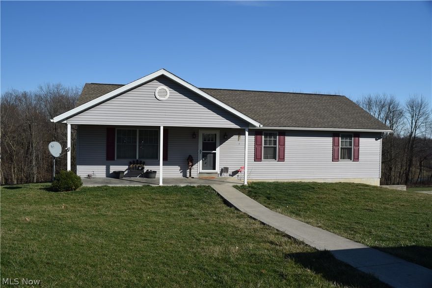 2012 Custom Amish built home with hardwood floors.  Open Floor plan with large eat in Kitchen that could boost a separate dining room.  The Kitchen features a  island  with seating and a pantry.  The basement is partially finished with a propane fireplace.  The house is wired to plug in a whole house generator.  The deck off the kitchen/ dining area is maintenance free with Trek decking and vinyl railing.  Amish built shed included.