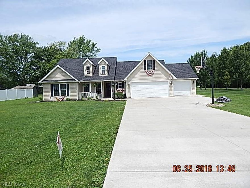 Stunning property! This 5 bedroom home has it all!  if you only need 4 bedrooms than the 5th doubles as an upstairs family room. This charming home has been decorated in neutral colors and is an open floor concept. Perfect for entertaining family and friends. There is a gas fireplace in the living room for those cold Ohio winters. Large Master suite is on the opposite side of the home from the other bedrooms. Double sinks in the master bath along with double walk in closets. Other bedroom closets are also spacious. This home was built in 2014, has hydronic heat in all the floors, tankless hot water tank, air conditioning in the attic, along with flooring and shelving for all your storage needs. The three car attached garage is also heated. The back yard is set as your own personal oasis, 6 ft. black washed privacy fence, 15 x 24 chlorine pool 52" deep, and an 8 person bromine hot tub on the patio. There is truly nothing to do except move in relax and enjoy.