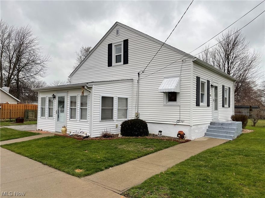 This well-maintained two/three bed, one bath bungalow is meticulously clean and ready for you to move into. This well-loved home features an inviting large living room with plenty of natural light, a cozy dining room, a galley kitchen, a full bath, and a large bedroom complete the first floor. All the kitchen and laundry appliances will stay with the home. Up on the second floor, you will find two tandem bedrooms. The laundry is located downstairs in the unfinished, full basement, along with a bonus storage room. You can also soak up the sun all year long in the enclosed sun room / 4-season porch. This property also has a two-car garage, a double-wide concrete driveway, and a partially fenced extra-large yard. Updates to the home include: New house roof (7/2021), HWT (9/2020), HVAC with humidifier (2014), Windows (1992-2021), Basement walls re-painted with Drylok paint (2022), and Gutter Guards were added to the house and garage gutters.