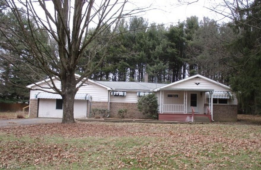 Crestview school district 3 bedroom, 2 bath ranch on a 1.25 acre lot.