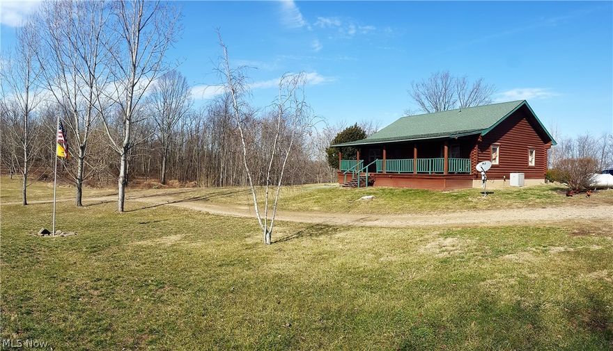 The Hunter's Paradise! 22 acres of prime hunting ground and a well-built 2 bedroom, 1.5 bath Log Cabin. Rolling hills with great mix of wooded and open land.  24x24 pole building for storage. Nice pavilion with a fire pit, a grill, and a great view, perfect for any gathering. This one won't last long.