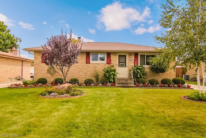 Welcome home to this charming, move-in ready 3 bed 2.5 full bath all brick ranch located in a quiet neighborhood. Optional 4th bedroom & additional living suite with full kitchen on lower level! Covered patio allows for optimal relaxation! Fully fenced yard! Great room features an open concept layout, new carpeting (2015), triple pane front picture window, faux painted walls & crown molding. Views of gorgeously landscaped yard with flower/vegetable gardens from the kitchen & dining room. Huge kitchen boasts all appliances, breakfast bar, tons of cabinetry/pantry & much more. Dining room has buffet serving area & decorators shelving. Spacious bedrooms with great closet space! Main bath has been updated with new surround, commode & vanity. Updated 1st floor 1/2 bath as well. Hardwood flooring under carpet on 1st floor! Finished basement offers living space, bedroom, updated full bath with new vanity (2017) & shower + a full kitchen! Storage, storage, storage! Glass block windows! Large l