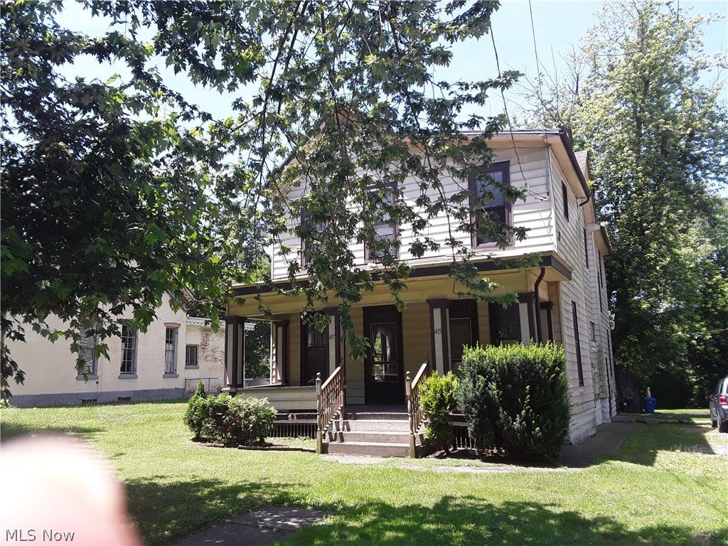 Great opportunity for investors! 2 unit conveniently located w/river access. Fenced area in back. unit 1 has 2 full bathes, kitchen has wood floors, oak cabinets, island w/ sink, garbage disp. cupboards above is more shelving for easy access items. stove, ref, dishwasher to stay. DR has hardwood floors, French doors from DR area to LR w/ another ornamental FP. Upstairs has a room currently being used as a sewing room but could be used as a 3rd BR. Full bath has washer & dryer hook up w/on demand water heater which will stay w/ property. Large BR also has orn. FP, lots of ceiling fans thru out the house. second unit has eat in kitchen, garbage disp. plenty of cupboard space. Stove, ref to stay. second apt. has 2 BR, laundry hookup. both sides have on demand water heaters & reverse osmoses water softner. Property has 3 separate parcels 415-417 is duplex & river frontage . 413 is vacant lot Homestead reduction is not included In taxes for 413-415. Muskingum watershed is $6 annually. Water