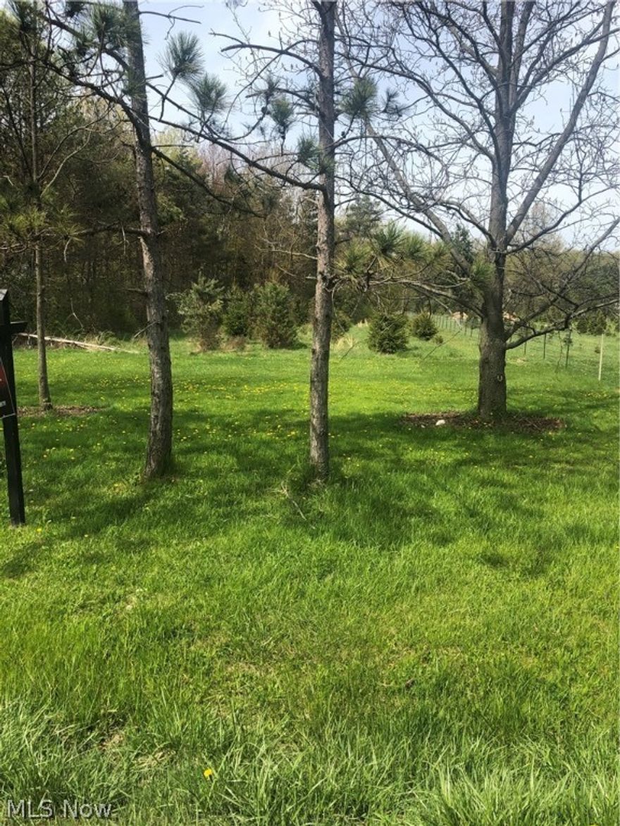 Beautiful 3.46 acre leveled lot ready to be utilized in a prime location in Olmsted Township! The rear of the property is heavily wooded with a bunch of Christmas trees and the front can be used for several purposes such as building your dream home. Water, sewer, gas & electricity is available. Close to Olmsted Falls historic district, shopping, schools, freeways, and Falls Pointe Development entrance with neighborhood sidewalks. Great award-winning Olmsted falls schools! Buyer to complete own due diligence regarding building in Olmsted Township. This Park-like setting is perfect for a Nature Lover and can be yours! Call now for more information!