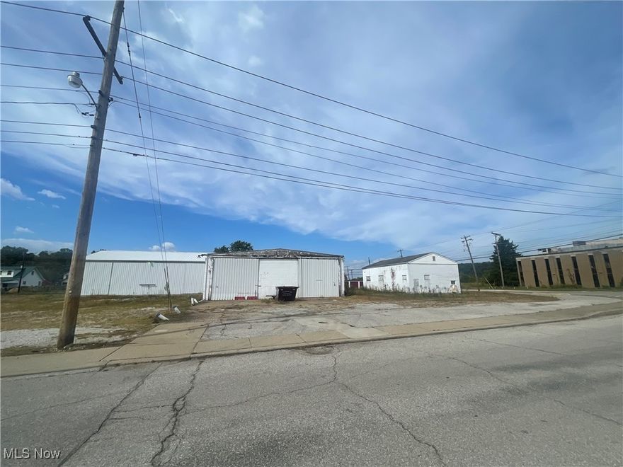 Location, Location, LOCATIOIN!!!!  Almost a 1 Acre Tract...3 Commercial Buildings!! Newest one built in 1999 3272 Sq St. Located at a traffic light off a 4-lane road. Close access to I-77 easy access for larger vehicles.