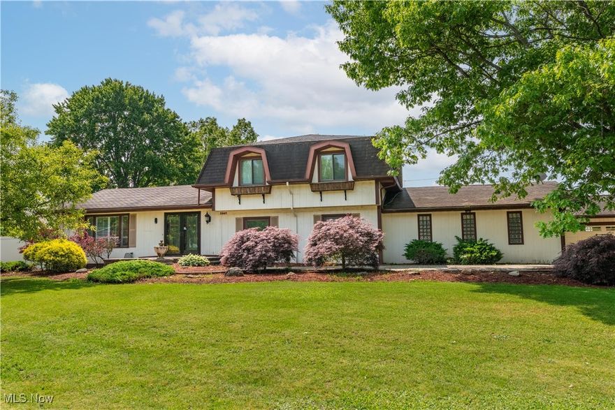This spacious split-level home with a finished basement offers over 3,000 sq. ft. of bright, inviting living space designed for hosting unforgettable gatherings. From the moment you enter the welcoming foyer, you’re greeted by glass double doors leading into the great room with vaulted ceilings, a grand staircase, and seamless flow into the formal dining room, complete with a chandelier. The eat-in kitchen features abundant cabinetry, a tile backsplash, a large pantry, and a generous breakfast bar perfect for casual meals or pre-party mingling. Views of the backyard oasis add even more charm. Downstairs, the cozy family room offers the perfect spot to relax, with a brick wood-burning fireplace and double doors that lead directly to the ultimate backyard entertainment zone. Step outside to find a private, fenced-in retreat with a deck, a patio, an inground pool, a fun tiki bar setup, and a mini pool house/shed for convenient storage. But the party doesn’t stop there! One bay of the detached 4-car garage has been transformed into a stylish recreation room complete with tile floors, a gas fireplace, a full bar with a sink, and a mini fridge, ideal for year-round hosting. The lower level also features a guest bedroom, a half bath, a laundry room, and access to the attached 2-car garage. Upstairs, you’ll find three generous bedrooms and two full baths, including a spacious primary suite with two closets, abundant natural light, and a beautiful primary bathroom with a tile walk-in shower and built-in storage. And finally, the finished basement is a host’s dream! With a second bar area featuring ample seating, wine storage, built-in TVs, a mini fridge, a sink, and a full-size refrigerator, there's more than enough room to gather, watch the big game, or celebrate every special occasion in style. This home has it all—space, style, and every feature an entertainer could want. Don’t miss your chance to tour this unique property. Schedule your private showing today!