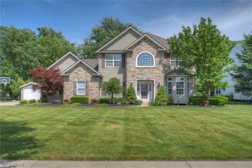Welcome to this beautiful, completely updated Gamellia built home on a quiet cul de sac with 9 ft. ceilings, 2 story foyer and vaulted great room.  This 4 bedroom, 4 full bath home with office and first floor laundry/mudroom offers the option of an in-law suite with it's own sitting area or 2nd office and living room.  The beautifully appointed kitchen offers an oversized island, double oven and stylish granite counters, wine/beverage cooler, gas stove and built in grill with hooded exhaust overlooking a brand new 2021 stamped concrete patio in a private, professionally landscaped  rear lot with 6 ft wooden privacy fence and full lot irrigation system.  The second floor offers 3 bedrooms, a shared full bath and a large master bedroom with large en suite bath and walk in closet.  The lower level has a fully finished rec room with a pool table that stays, a full bath and an additional living space.  Two car oversized side entry garage with a detached 1 car garage or storage shed.  This l