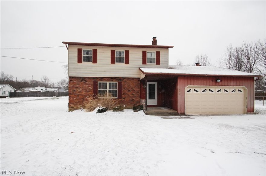 Mentor 2-story with 2 car attached garage and a Large 44x24 outbuilding/ 4 car garage with upstairs that would be great for anyone that has cars, construction business, hobbies or just needs storage. Yes, the home does need some updates like painting and flooring. The good news is that the furnace and AC are only a couple years old and the hot water tank is newer as well. The roof on the home and detached garage is approximately 10 years old and windows on the front of the home have been replaced. Spacious living and dining room and eat in kitchen. First floor family room with a wood-burning fireplace. Fenced area off the fam rm offers privacy and is great for pets to roam but the yard is much larger being almost ½ acre. This home has much potential and is in an area close to freeway access and other amenities. Home is wired with hook-up for a generator. One Year Warranty offered thru America Preferred.