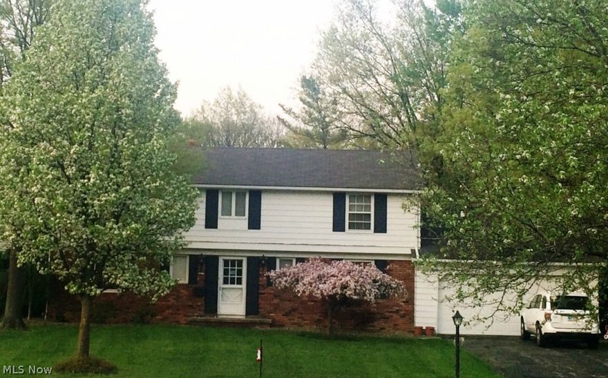 Just reduced!!! Check out this great 4 bedroom colonial in popular Meadow Wood Estates community. Membership to private park with in-ground pool is optional. Easy access to Acacia Metro Parks. This home features generous room sizes, a large master bedroom with master bath, living room with wood floor and wood burning fireplace. Exposed brick in living and family room. Family room is open to the kitchen and has sliders out to patio. Formal dining room. Huge first floor pantry that is also plumbed and wired for laundry, if desired. Furnace and central air installed in 2010, new hot water tank in 2013. Basement has been waterproofed and includes two finished rooms, a pool table and wet bar. Easy highway access, minutes from Legacy Village and Beachwood Place.