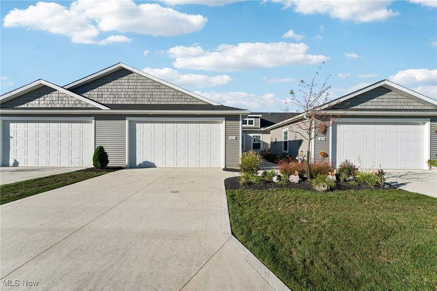 Welcome to this beautiful 2 year old home in the desirable Landings at Ridgewater Community!  Step into style and comfort with this stunning home designed for easy one-floor living boosting many upgrades.  The beautiful open concept chefs kitchen is perfect for everyday living or entertaining, and features quartz countertops, stainless steel appliances, upgraded gas range, a large breakfast bar and pantry for extra storage.  The kitchen flows seamlessly into the dining and living areas with soaring vaulted ceilings and luxury vinyl plank flooring which continues throughout the entire home.   The spacious master suite is filled with natural sunlight from an oversized window, and features a large walk in closet and en-suite bath with quartz counter top and walk in shower for easy access.  This master is the perfect spot to unwind at  the end of the day.  The second bedroom, is ample sized and could be used for a guest room, office, craft room or man cave.   A second full bath is just steps from the guest room.  Dedicated laundry room with utility sink and a gas line installed for dryer.  Insulated, heated, and built for comfort and convenience this spacious 2 car garage is for more than just parking.  Perfect for hobbies or projects, with lots of extra room for storage.  Refrigerator in garage to remain. Enjoy outdoor living on the oversized patio complete with hardtop gazebo with netting and curtains.  Whether you are hosting a summer cookout or savoring quiet mornings with coffee this inviting space makes outdoor living effortless and enjoyable.  A Generac whole house generator providing peace of mind during power outages.   Maintenance free living with HOA covering grass cutting and snow removal.  Don't miss the opportunity to own a like-new, move-in-ready home in a fantastic location.