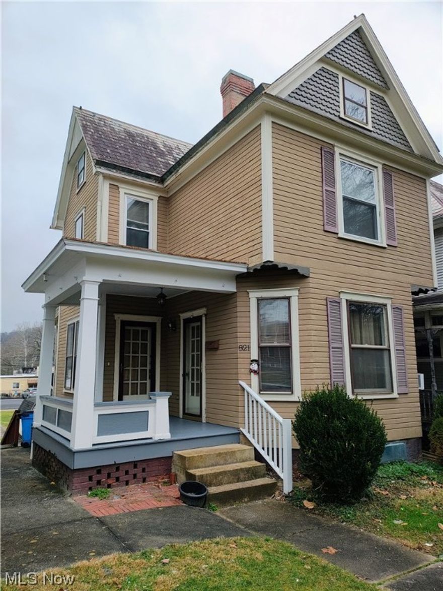This gem on Second Street is awaiting a new owner. It welcomes you with 2 front entrances and a charming front porch. Inside are hardwood floors, 2 fireplaces and historic charm. The living room has several windows that bring in lots of natural light. A dining area and kitchen plus a full bath finish off the main floor. Upstairs are two bedrooms and the attic entrance behind the bookcase for storage. In the partially finished basement you'll find the laundry area, a place to put a wet bar, extra living space, or even another bedroom. Walkout out of the basement to a nice sized, flat backyard with a storage shed and room to put a garage or carport for off street parking. Call today for your showing!