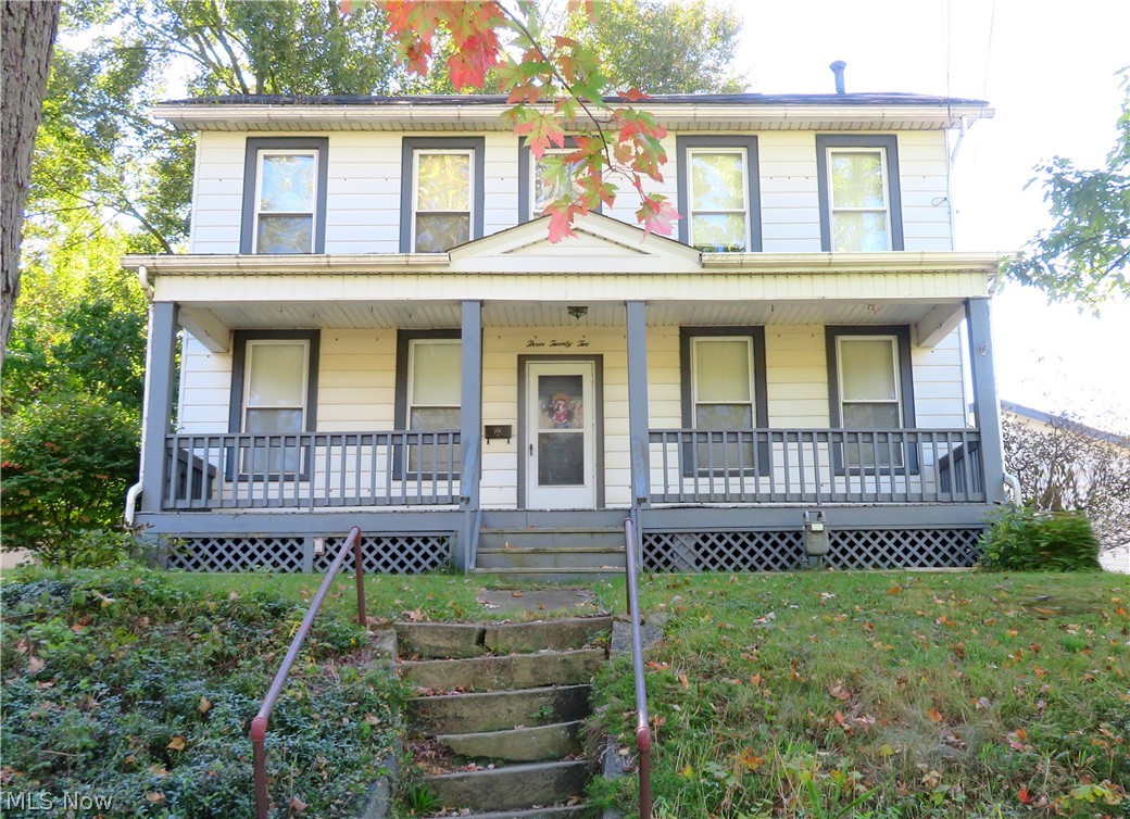 Century home built in 1900. 3 bedrooms 1 1/2 baths. Full front porch, enclosed rear porch, 2 car garage, updated vinyl windows, Gas forced air furnace, Gas HWT, update electrical box. The home is in need of repair. he home is being sold AS IS. This home will not last long!