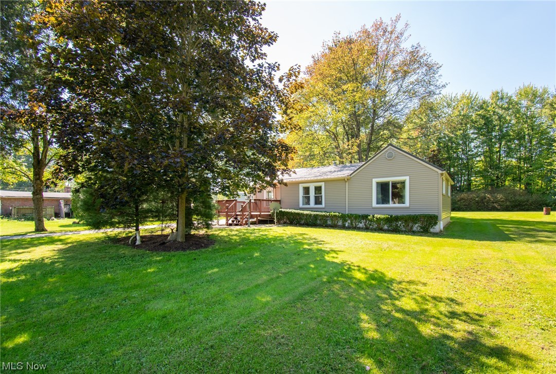 Beautifully renovated 3 bedroom, 1.5 bathroom home. This delightful house exudes character, boasting hardwood floors, built-in shelving, an elegant chandelier in the dining area, and a charming pine plank ceiling. The kitchen has undergone a full transformation, featuring modern cabinets, updated countertops, stylish light fixtures, and a striking brick accent wall. The primary bedroom offers generous storage space with two sizable closets. Convenient first floor laundry adds to the appeal, making this an ideal one story living space. The property also includes a spacious two-car garage, second parcel, a brand new black metal roof, and thoughtfully designed landscaping.