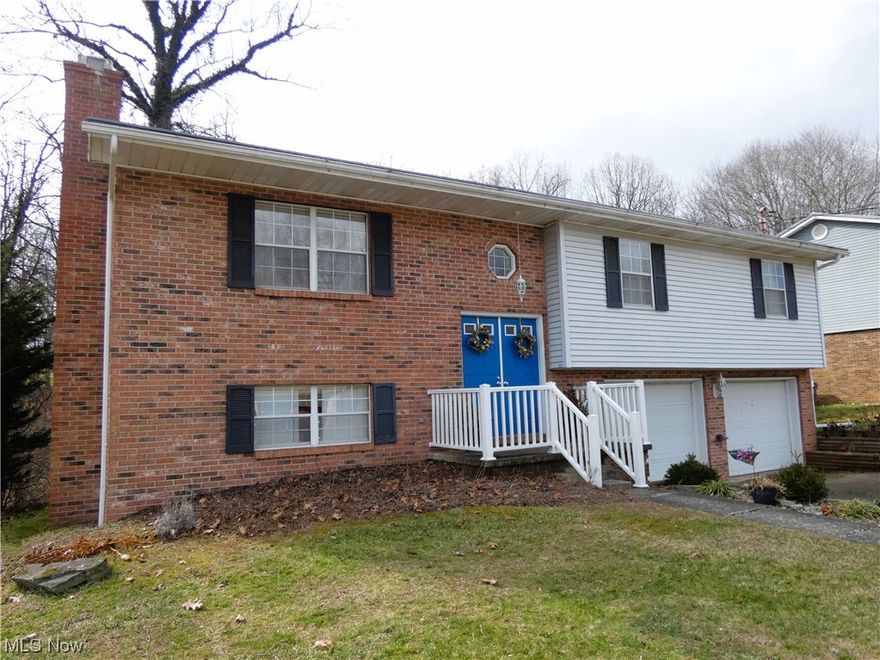 Welcome to 92 Northwood Villa Lane! This very lovely 3-bedroom, 2.5-bath split-level design boasts unparalleled comfort and space. Nestled in the community of Northwood Villa Estates and just minutes away from essential amenities like grocery stores, dining options, and shopping, this home offers the perfect blend of convenience and tranquility. You will love the kitchen, complete with a spacious island/bar, abundant counter space, and ample cabinetry. Adjacent to the kitchen, the separate dining area opens onto a covered deck, providing a serene backdrop of wooded views for your dining pleasure or simply relaxing. Each bedroom is generously sized, with the master bedroom featuring large double closets, ensuring comfort and convenience for every member of the household. Entertainment awaits in the lower level, featuring a cozy fireplace and a sophisticated wet bar, perfect for hosting gatherings or unwinding after a long day. Plus, a convenient half bath adds to the functionality of this fantastic space.  With an oversized 2-car garage offering ample storage, you'll have plenty of room for your vehicles and belongings. And for added peace of mind, a home warranty is included for the new owner, ensuring worry-free living. Don't miss this opportunity. Schedule your showing today and make this beauty your very own.