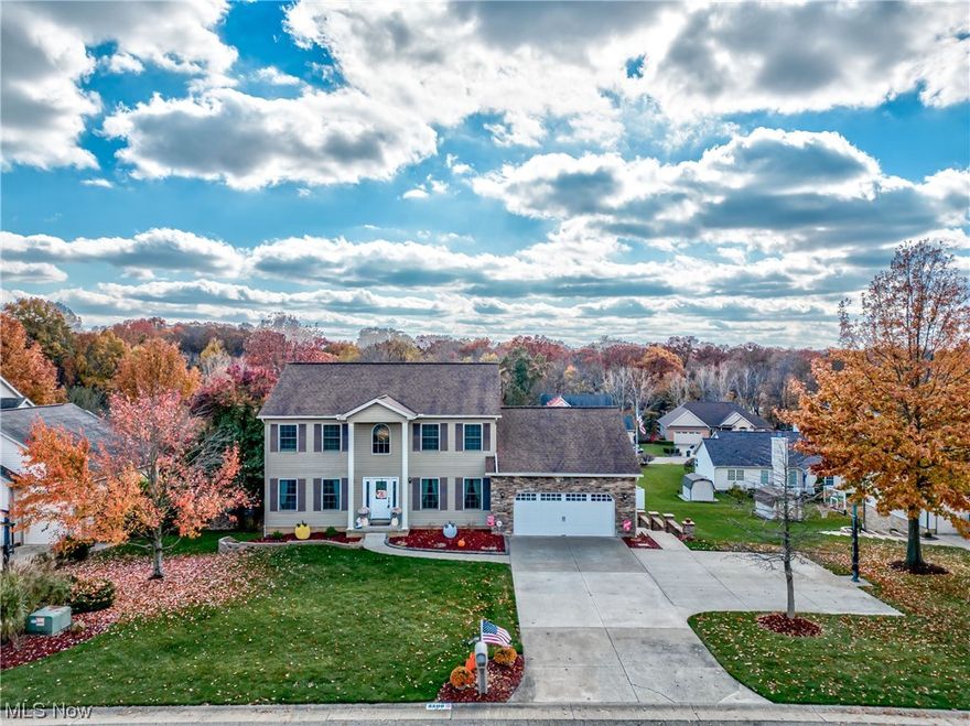 Boasting over 3,800 square feet, this expansive 4 bedroom, 3.5 Bath colonial is an entertainers dream! As you step into the welcoming two-story foyer, you'll find a formal living room and a private office with chic French doors. The formal dining room connects to a well-appointed eat-in kitchen that features solid surface countertops, a spacious island, stainless steel appliances and sleek oak cabinets with pantry. The family room features new LVT flooring with vaulted ceilings and skylights. For added convenience, the laundry room and half bath are both located on the first floor as well. Each of the three updated bathrooms in this home exudes a modern elegance with fashionable tile flooring, granite countertops and upgraded lighting and mirrors. Upstairs, the spacious master suite offers an updated bathroom with walk-in tile shower w/dual showerheads, a double vanity with granite countertops and a walk-in closet. Bedrooms 2 and 3 are adorned with newer carpeting and feature ample closet space. Both bedrooms share a fully remodeled hall bath. The walkout lower level is designed for modern entertainment, offering a stylish wet bar, rec room, a versatile bonus room, a fourth bedroom with a walk-in closet, and an additional full bath. Invite the neighborhood to cool off in the 18x36 pool or hang out on the four-tiered deck that's designed to for large gatherings. Schedule your own private showing today!