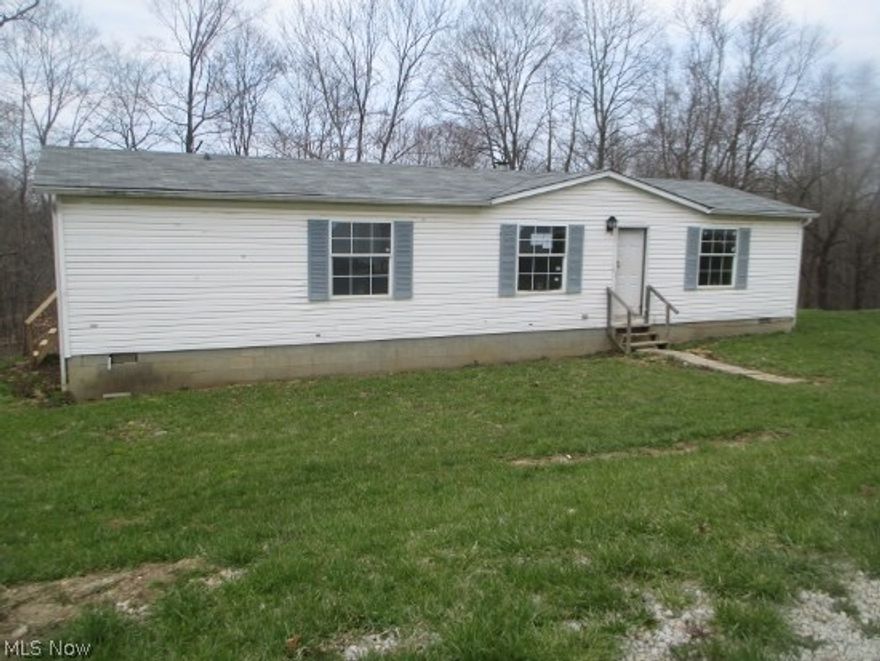 Country Setting, situated on 5 acres of ground, nice detached garage. Home offers a large open floor plan with fireplace. Master bedroom has private bath. 
Home is in need of TLC and repairs. HUD Case #413-623254 home is UI (not insurable with FHA) cash or conventional loans only.
Selling in "AS IS" condition with no warranty or guarantee of any kind.