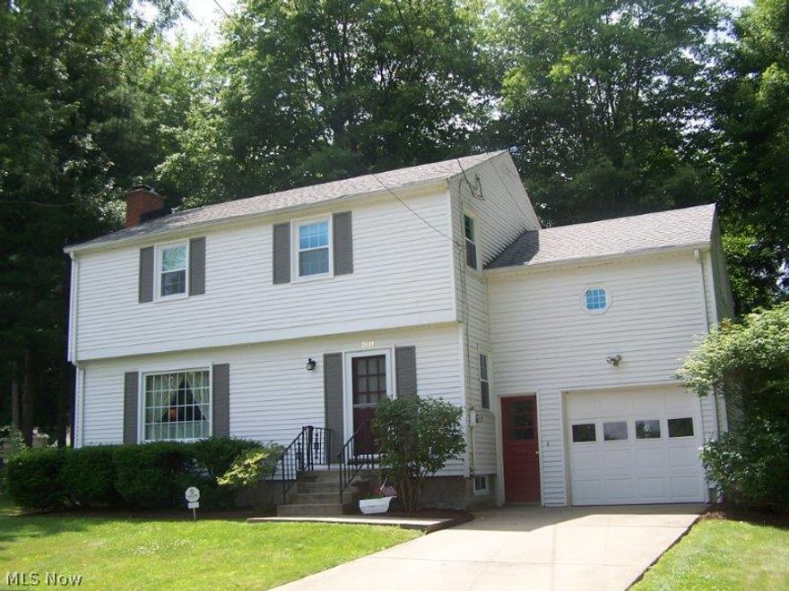 Situated on a quiet cul-de-sac, this lovely colonial has wonderful curb appeal the moment you pull into the driveway. Your 
"second backyard" is just a short distance away with the entrance to Mill Creek Park and all it has to offer!  Some of the most important features to this home are the newer furnace and air (2011), complete tear off roof (2009) newer garage door and opener, hot water tank (2007), and new replacement windows (2012).  Hardwood floors are under first floor carpeting, and exposed throughout the entire upstairs.  In addition to the formal dining room, there is a convenient eat-in kitchen for everyday meals and a view of the wooded backyard.  Put this comfortable, sweet home on your list to visit!