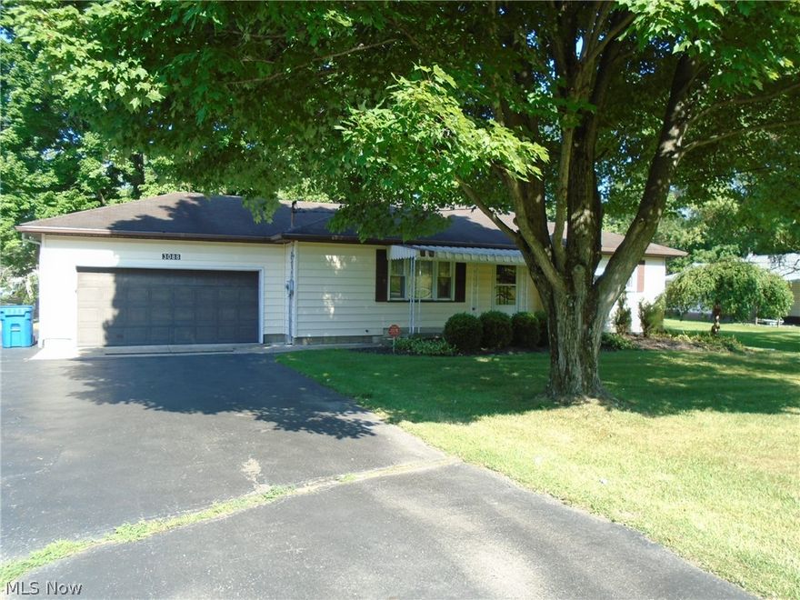 BEAUTIFUL THREE BEDS, Ranch and extra large lot with two mature Apple trees, Hardwood floors thru out, updated kitchen with white cabinets and stainless steel appl. large family room in basement with a bar and built in.