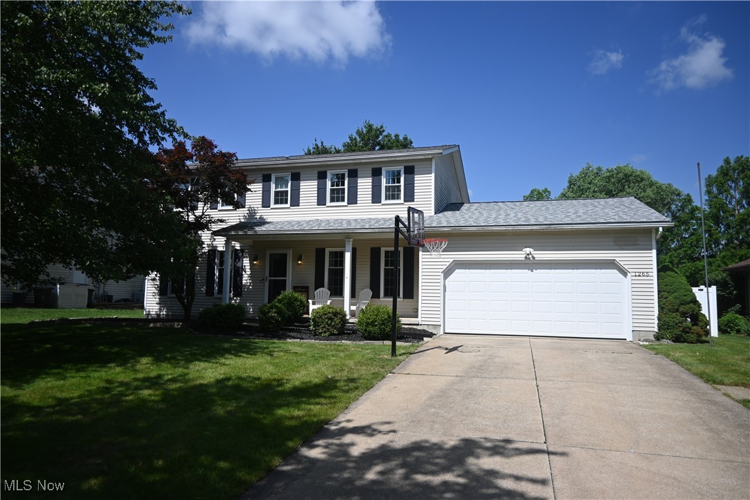 Spacious and updated, 1265 Waterbury Dr in Medina offers 5 bedrooms-including 2 primary suites, one on each level-perfect for multi-generational living or guest flexibility. The open floor plan features luxury vinyl flooring throughout the main level and bright eat-in kitchen with white cabinetry, granite countertops, and stainless steel appliances. Enjoy year round entertaining in the finished basement or step outside to your private oasis with a maintenance-free Trex deck and and above ground pool. This home blends comfort, style and function in a desirable Medina neighborhood. Schedule your showing today!