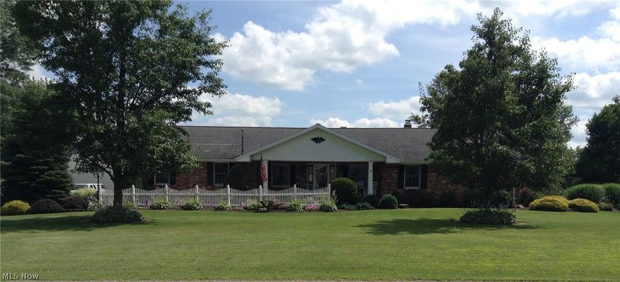 Wow!  How do you begin to describe a home like this! This one owner, all brick ranch has been meticulously maintained and recently updated! You will LOVE this spacious kitchen, complete with Quartz counter tops, Riceland cabinets, tile back splash,and a beautiful Farmhouse style sink.  There is a great pantry area, breakfast bar for morning coffee, and all appliances remain.  So many other details - over and under lighting, lazy susan, and pull out cabinet drawers!
The kitchen flows into the dining area and on into the living room.  The large living room has lovely solid oak crown molding, newer carpet, and a wood burning fireplace with insert.  Do you need a home office? You will want to see this one with the hickory distressed flooring, Riceland cabinets, and beautiful French doors.  Speaking of doors - we have solid oak 6 panel doors throughout! Of course there is a first floor laundry room - washer and dryer convey!  The main bath has also been updated with beautiful tiling. 
Out