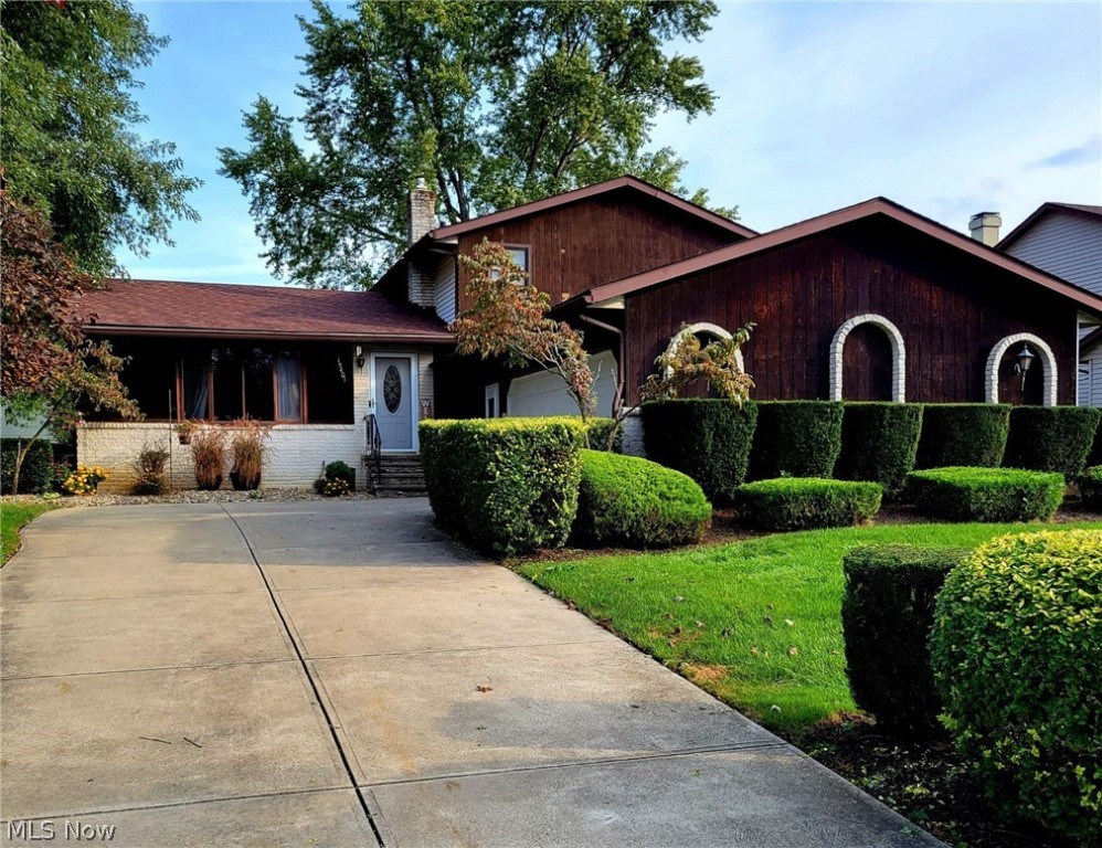 This fabulous Maple Heights Split-Level sits on one of the newest streets in Maple Heights. You will walk into a beautiful layout in this home that features a large eat-in kitchen that over looks a generous sized family room with a gas fireplace. Right off the family room you will enjoy the enclosed patio that looks into the back yard. This home has 4 large sized bedrooms with one of the bedrooms on the main level. There are 2 full updated bathrooms. This home has a large 2 and a half attached garage with ample storage space. There has been many updates to this home which includes newer furnace, central air unit, hot water tank, garage door, roof and flooring. Next to the home you will a large parcel of land for outdoor gatherings. Showings to begin on Saturday 10-2-21