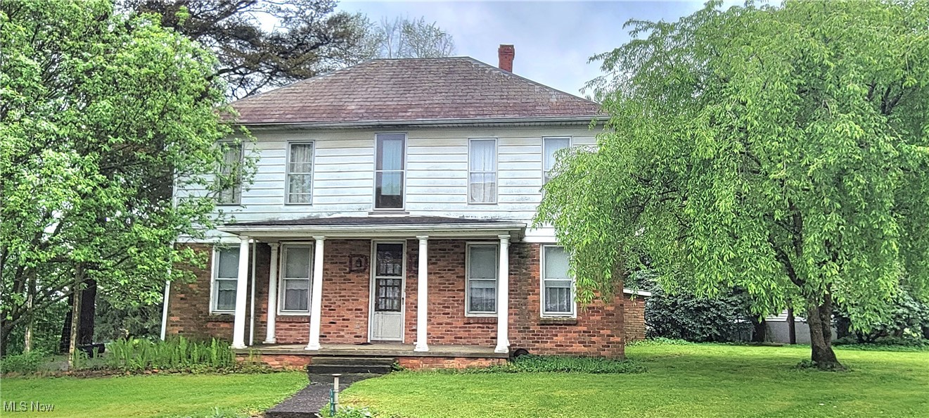 This property has so much potential!! Almost a half-acre lot with a 2700 sq ft home. Entering into the home is a closed in mud room that goes into the large room that has a wood stove and steps that goes to the basement. To the left is the large dining room and kitchen that has a small gas stove for extra heat. Off the kitchen is the laundry room that also has a door to the room with a hot tub. In the hallway is storage space and a freezer. To the right of room with the wood stove is a step up into a large room that could be a family room with a large bay window and the main full bathroom. On the front of the home is a large living room , and another