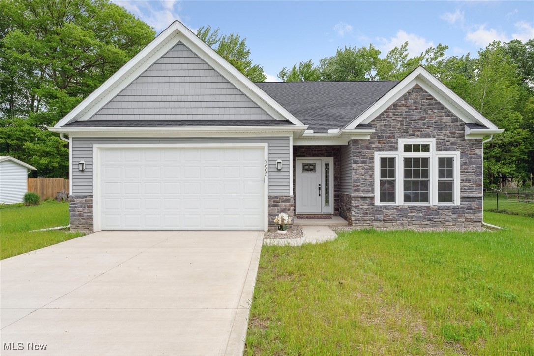 Find your forever home (or a perfect summer retreat) in this stunning modern ranch in Madison. Beautiful stone veneer exterior, soaring vaulted ceilings, grand arched entrance, and unforgettable fireplace will leave a lasting impression on your guests - and you'll feel like royalty every time you step inside. Elevate your dining experience in this white open-concept kitchen, featuring granite countertops, a generous sized island, and top-of-the-line appliances. House offers 3 spacious bedrooms and 2 luxurious full bathrooms all on the same floor. Master suite with tranquil forest view offers an in-suit bathroom with gorgeous tile, blue vanity with granite countertop and a walk-in closet. High-quality flooring throughout, laminate floors in high traffic areas and soft carpet in all bedrooms. Everything is well thought out here: modern lighting,2 car attached garage with 8' ceiling, 16' wide driveway. Expansive 18'x17' concrete patio is perfect for entertainment and relaxation. The builder owns a substantial forest lot behind, and can sell 1 acre for an additional price.
Escape to serenity in this idyllic setting, just 5 minutes from the lake and nestled between breathtaking Parks, Golf Clubs, Wineries and Restaurants. There is so much to do in the summer! Hikind, biking, swimming, and playing. The house is located near Arcola Creek Park with a private beach, picnic area and canoe/kayak access. Very close to Madison township park and the famous Geneva-on-the-lake nostalgic Strip. This charming neighborhood embodies the perfect blend of friendly community spirit and relaxed coastal living. With its laid-back atmosphere and picturesque surroundings, it's the ideal place to unwind and feel right at home.