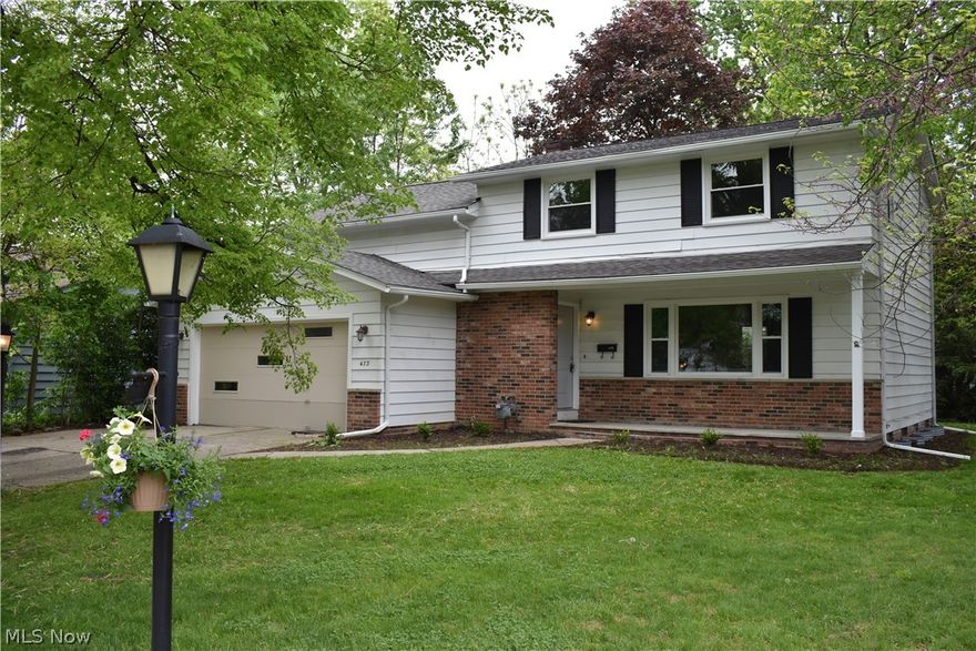 What an amazing opportunity to own a Large Colonial in the Heart of Berea.  This stunningly beautiful home will rise to the top of your list with its brand new roof, windows, appliances, exterior doors and free home warranty.  This 4 bedroom, 2 1/2 bath dwelling with well defined living spaces and a classic floorplan is what you waited all winter to buy.  The kitchen is the Jewel of this Home and a Chef's Dream.  The space features the Highest Quality Craftsmanship with USA made Full-Heights Cabinets, Granite Countertops with Undermount sink, Huge Entertainer's Island, and New stainless-steel appliance package.  The Modernized interior of this home features a contemporary color palette, new lighting, updated hardware and faucets, luxury vinyl and ceramic tile, as well as restored hardwood flooring.  The first floor is not just great entertainment space with ample natural light, it has an attractive half bath and a partitioned laundry room.  The upstairs offers four generously sized bed