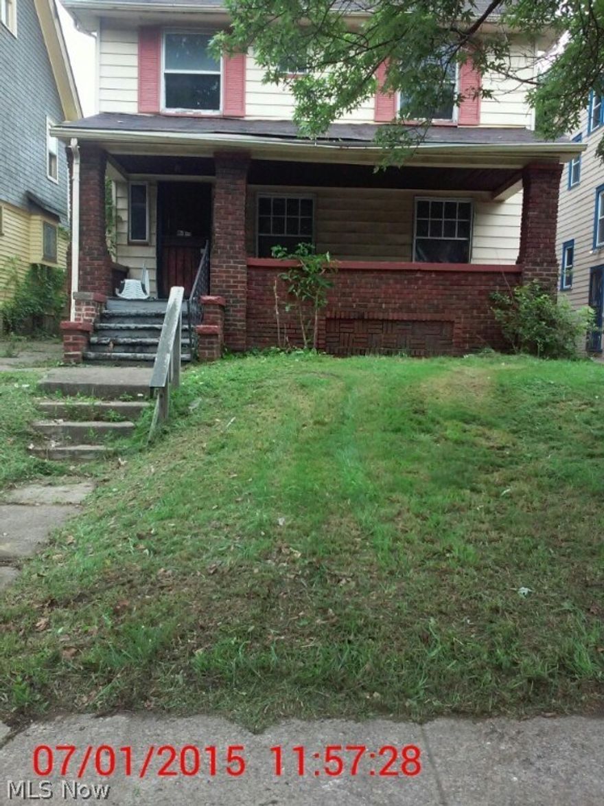 WOW - MUST SEE.  Schedule your showing for this spacious Colonial located in East Cleveland.  Featuring 3 bedrooms; 1 full bath.  Formal Dining Room and Living Room as a decorative fire place.  Large front porch to relax on during the summer months.  Add you personal touches and call this home.