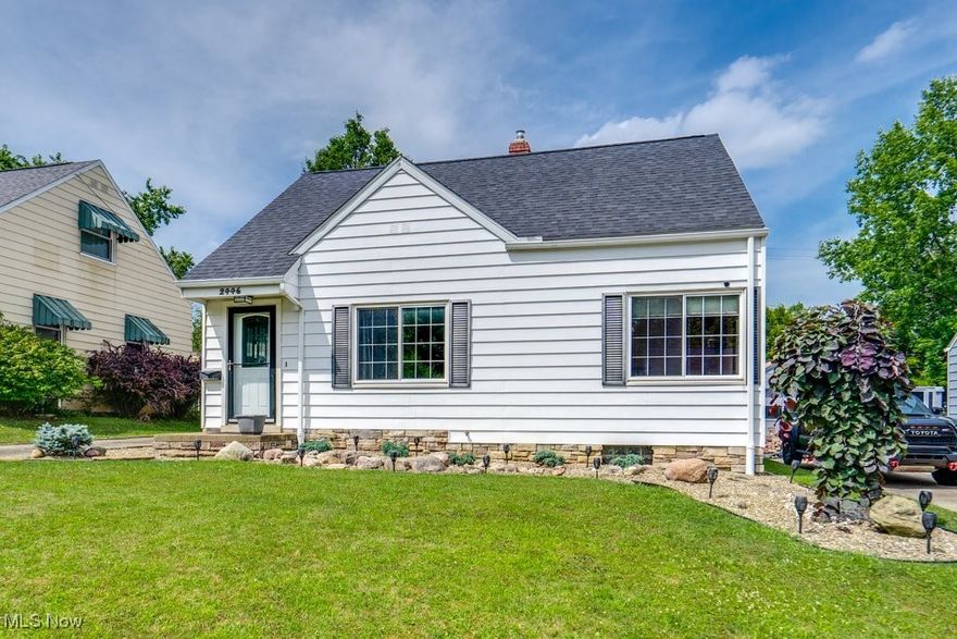 This cozy Cape Cod offers practical living with a welcoming main floor featuring living room, dining room, and fully equipped kitchen. Two bedrooms and full bathroom complete the main level, while upstairs you'll find a sitting area/bonus room and third bedroom.
Access the backyard patio with fire pit directly off the kitchen. The standout feature is the impressive 32x24 three-car garage with 5" thick concrete flooring, ready for a lift installation if desired. The garage is set up for 240v service (not currently installed). Recent updates include new furnace and A/C installed in 2023. Enjoy the convenience of this desirable Cuyahoga Falls neighborhood with parks, schools, hospital, shopping and restaurants all within walking distance. This well-maintained home combines comfortable living spaces with exceptional garage functionality and prime location. Schedule your showing today!