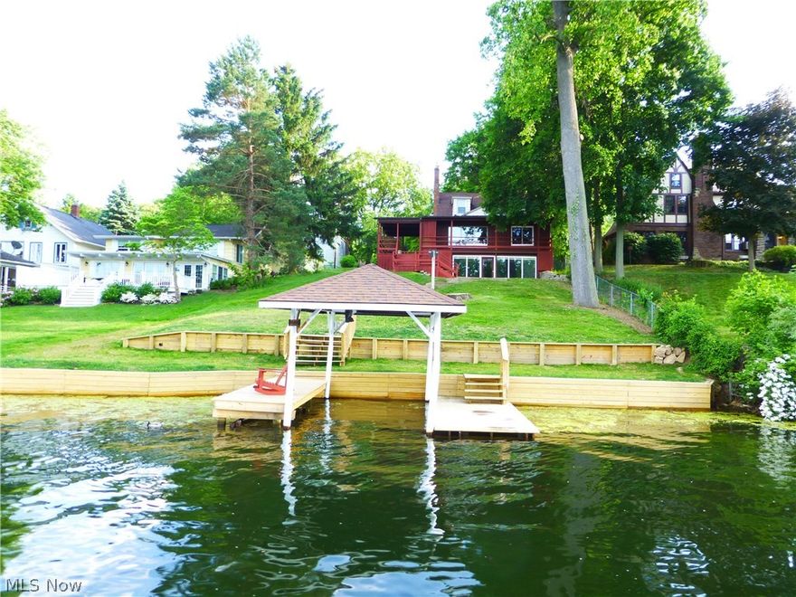 80 feet of frontage on East Reservoir within sight of the Coventry clock tower, with a big water view and lots of parking. The major renovations have just been completed including deck repair and staining, interior painting, vinyl, carpeting, landscaping and a new seawall. The two car detached garage has an electric door opener and the freshly cleaned and painted  walk out basement at the lake level. Two new docks, one of which is lower for easier canoe and kayak loading and both of which have some roof protection. First floor master bedroom and full bath. Well and county sewer. The lakeside wrap around deck is shaded in the afternoon, but has the sun in the morning to go with your coffee. While you might want to add a few personal touches, this home is very cute and ready to move into now.