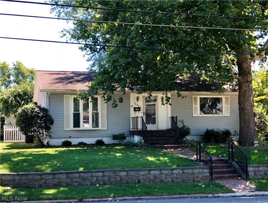 Beautiful home located in North Parkersburg on a corner lot.  The stunning 19x12 sunroom was recently added with lots of natural lighting and marble flooring.  The full bath on the main floor was recently remodeled.